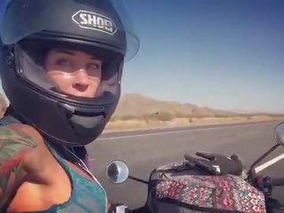 Felicity feline motorcycle femme fatale riding aprilia in bra